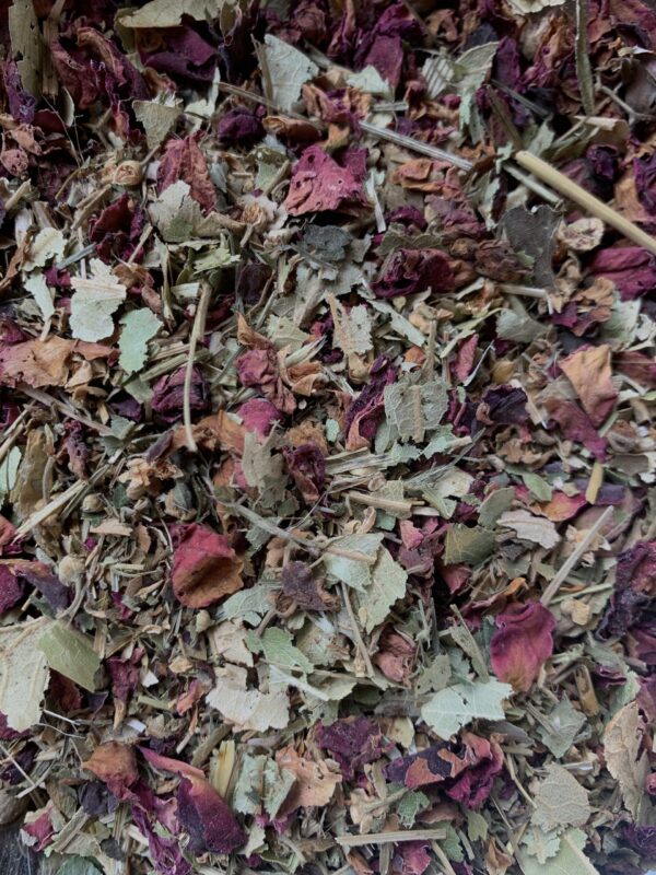 uplifting heart herbal tea blend for grief and heavy heart with linden, hawthorn berry, holy basil, rose petals, motherwort, oatstraw